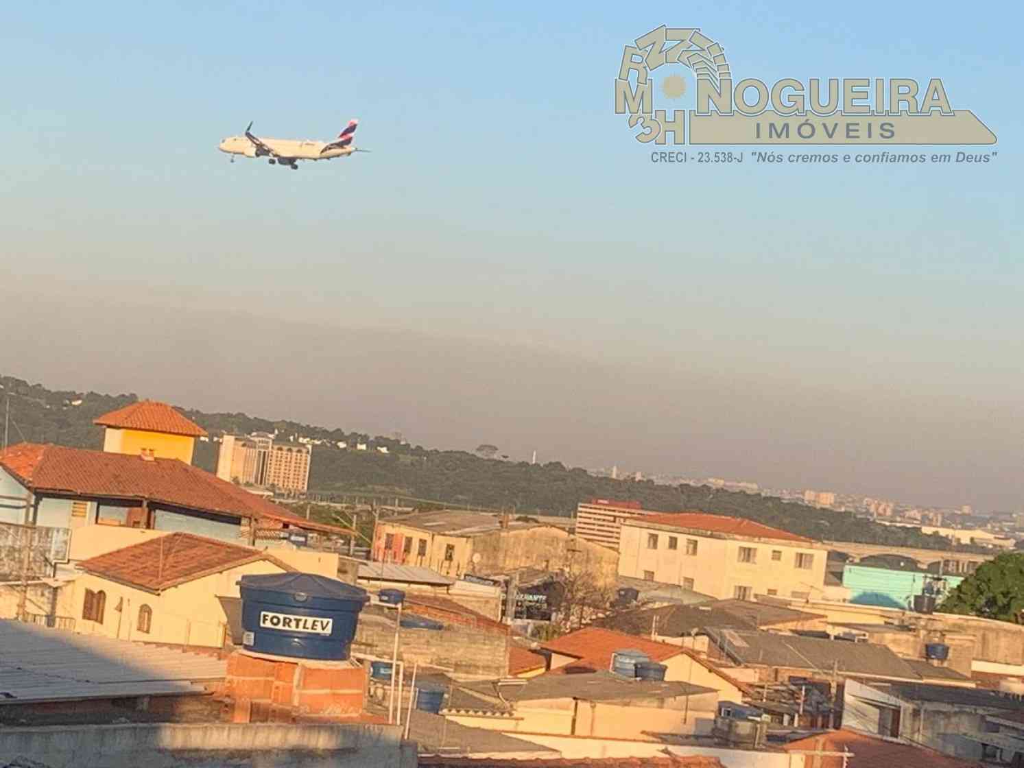 Terreno com 4 casas antigas bom para investir - Jardim Bela Vista